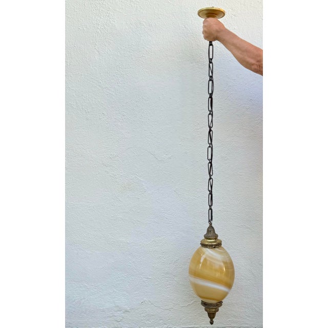 Vintage Murano Style Very Large Oval Shaped Blown Glass Pendant With “Onyx” Glass Swirl Golden Coloration and Brass Fittings For Sale In Los Angeles - Image 6 of 12