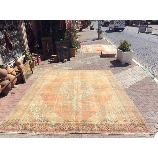 This gorgeous Hand knotted Vintage Anatolian area rug is approximately 60 years old in excellent vintage condition. The...