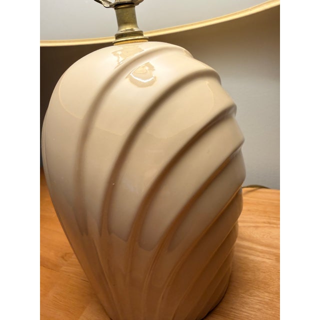 Elevate your space with this stunning pair of sculptural ceramic table lamps. Dating from the 1980s Art Deco Revival era,...