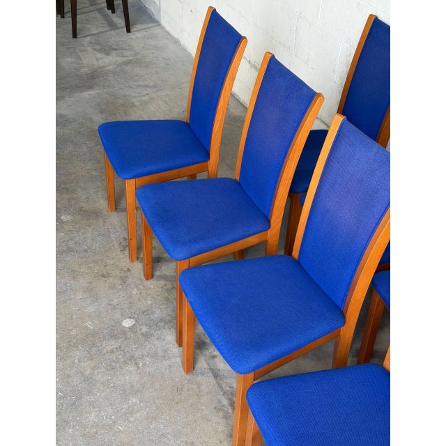 Beautiful set of 8 Danish modern dining chairs manufactured by Skovby in Denmark. Crafted in teak, these chairs feature...