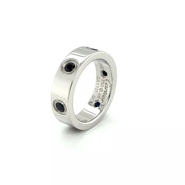 Brand: Cartier Collection: LOVE Limited Edition ( this ring is 70/200) Style: Blue Sapphire Band Ring Material: 18k white...
