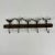 A delightful American primitive 19th Century hand forged metal utensil game rack, with 5 hooks. A lovely decorative piece...