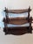 Vintage 3 tier cascading wall shelf with fret work and decoration. Great display piece.