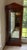This piece is an Ethan Allen Medallion Collection lighted curio cabinet, a high-quality Neoclassical-style display case...
