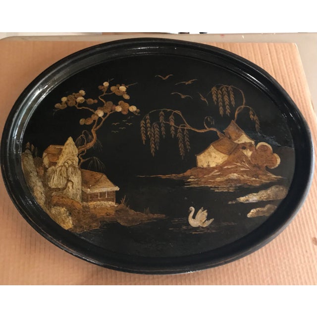 Hand Painted chinoiserie designed antique tole tray. Old and still vibrant is the name of the game. The tray has had a...