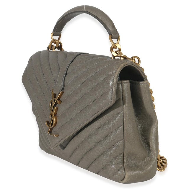 Item #: 152738 Interior Material: Fabric MSRP: 2,650 Features Interior: One zip pocket. One slip pocket Dimensions: 9 x...