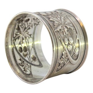 Silver Napkin Ring with Raised Floral Motifs Surrounding a Monogram Card. For Sale