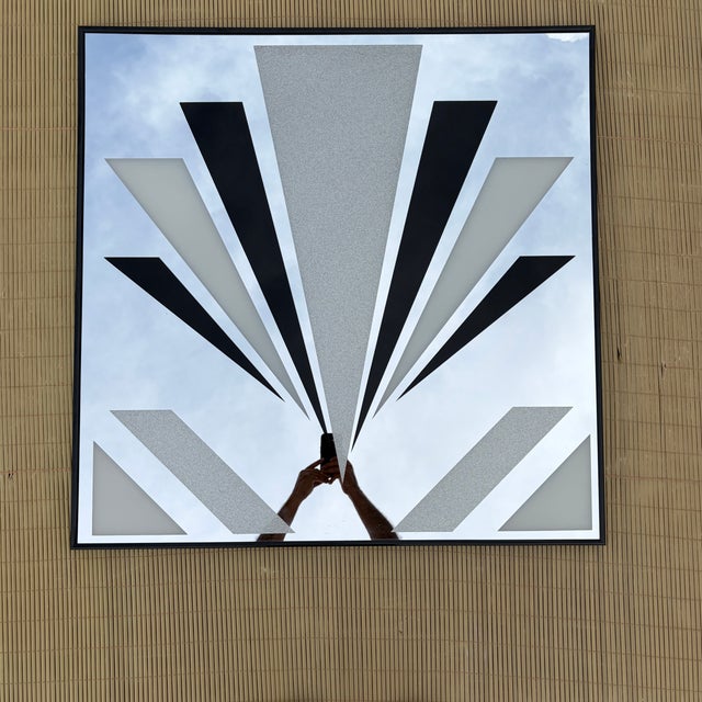 Vintage 1990s Art Deco Revival Geometric Desing Framed Wall Mirror. Features monochromatic geometric pattern painted over...