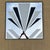 Vintage 1990s Art Deco Revival Geometric Desing Framed Wall Mirror. Features monochromatic geometric pattern painted over...
