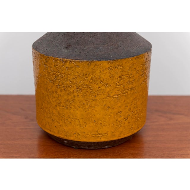 Rare midcentury Studio pottery vase - handmade - featuring a color block palette of mustard and brown glazes with a white...