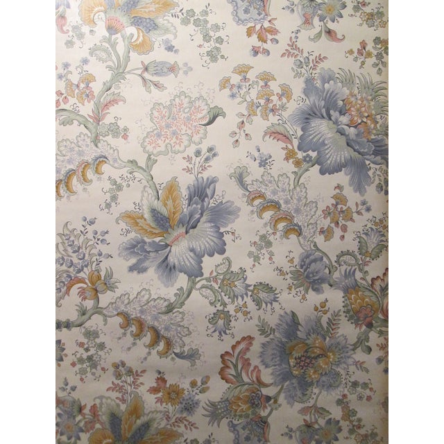 Vintage wallpaper from the 1970s. Blush blue floral paisley motif on an off white background. 8 meters length x 51cm width...