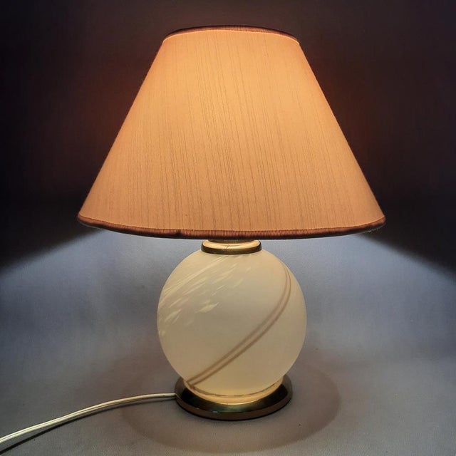 A beautiful vintage table lamp from the modern era, attributed to fine Italian craftsmanship from the 1970s. Design and...