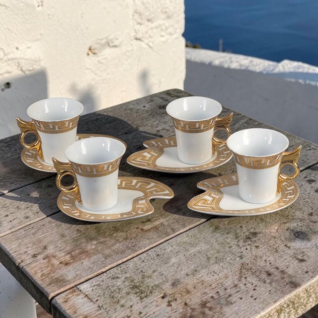 This set of 4 demitasse Greek key cups and saucers is made of Japanese imperial porcelain with a gilded design. The Greek...