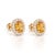 Brighten your style with these radiant citrine oval halo stud earrings, crafted to capture pure warmth and golden...