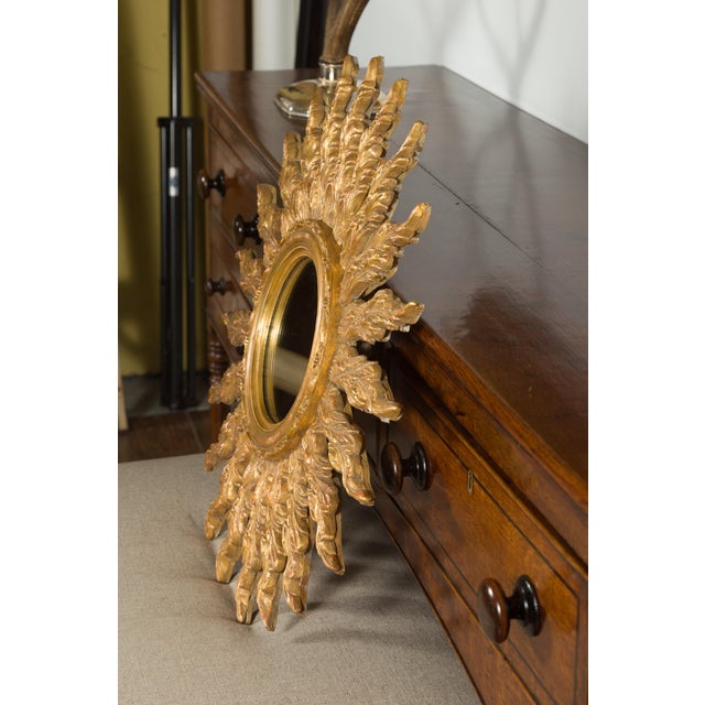 French Giltwood Sunburst Mirror with Wavy Sunrays from the Mid-20th Century For Sale - Image 11 of 11