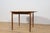 This round extendable dining table was produced by G-Plan in the 1960s. Teak elements cleaned from the old surface and...