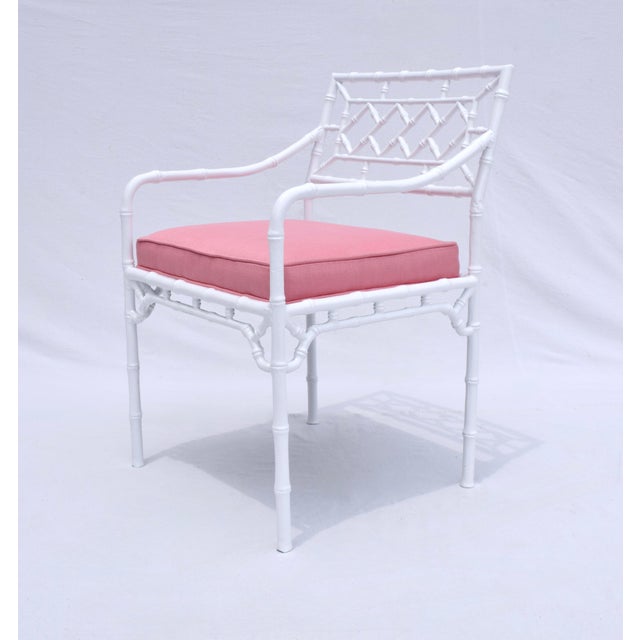 A scarcely seen 1960's faux bamboo cast aluminum dining table with four chairs, fully restored in new bright white powder...