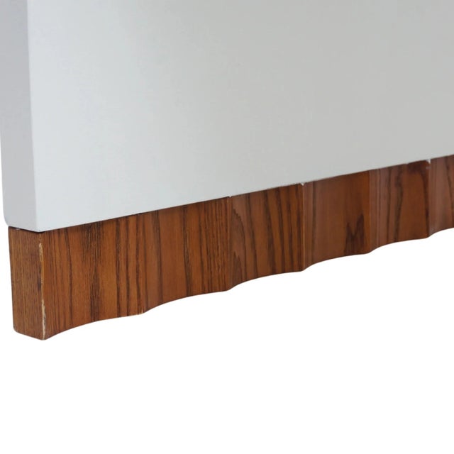 Slick, sleek, and dazzling in white, this waterfall coffee table may mesmerize you with its curves and blind you with its...