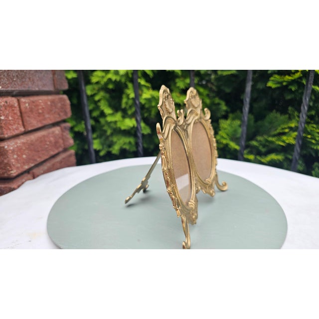 Double brass frame, under glass, 1970s–80s, dimensions: height 18.5 cm, width 20.5 cm, depth 13 cm. Dimensions of each...