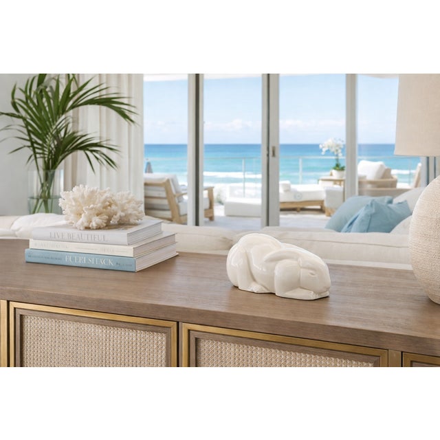 Offering a LARGE vintage 1980s Mikasa white porcelain bunny rabbit table sculpture, circa 1980s. This sophisticated...