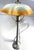 A unique vintage table lamp with an amber glass shade, ikea model b9512, dating from the 1960s–1990s. this elegant and...