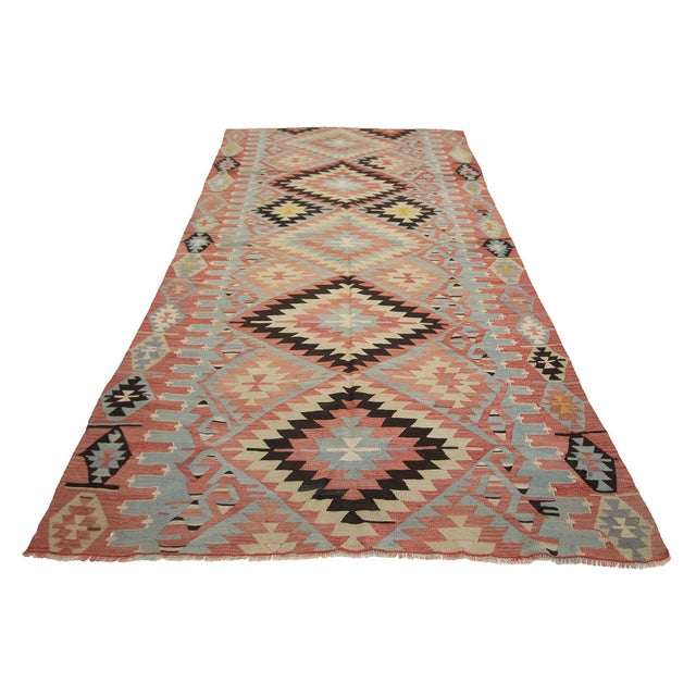 Handwoven vintage kilim rug from Denizli region of Turkey. Approximately 50-60 years old. In very good condition.