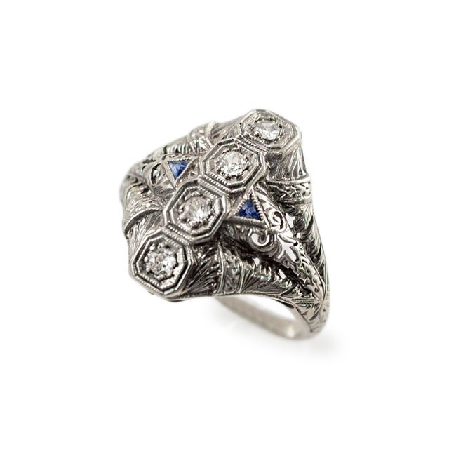 Gender: Ladies Metal Type: 18K Yellow Gold Size: 7 Width: 18.50 mm Weight: 4.60 Grams One ladies handmade filigreed 18K...