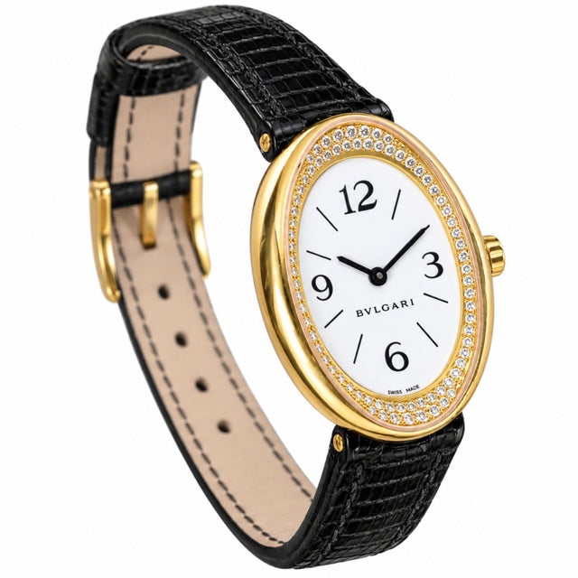 Bvlgari Ovale ref. OV32G in 18K yellow gold, circa 1990s, featuring a white dial with black Arabic numerals and baton...