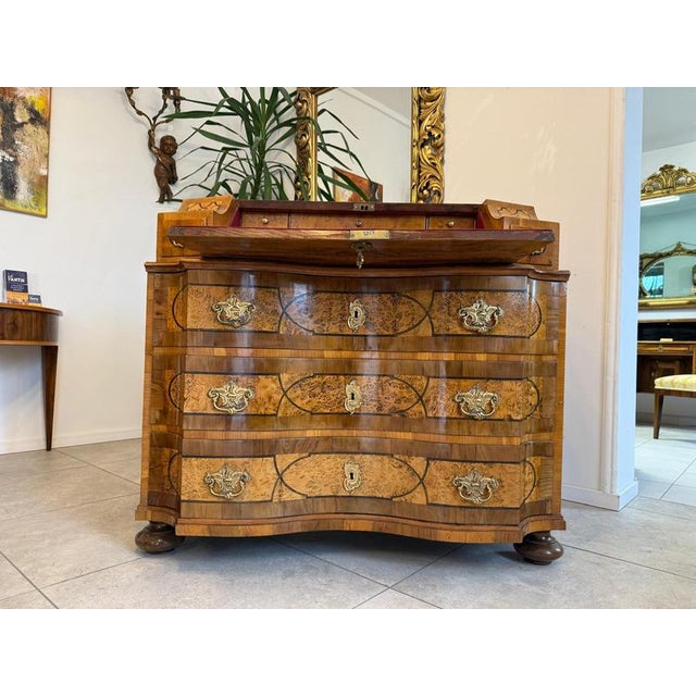Baroque secretary desk in walnut with fruitwood marquetry, dated circa 1780. Dimensions: Height x Width x Depth 109 x 118...