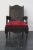 Anglo Indian colonial armchair, carved out of teak wood, under the armrests stand 2 lion heads, on the central rosette...