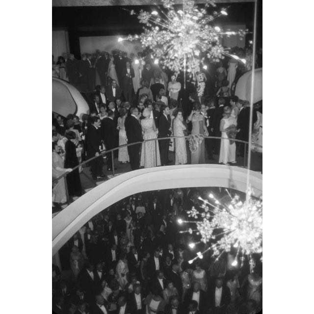 Balcony Glamour by Toni Frissell Guest at the opening of the New Metropolitan Opera House fill the balcony in suited...