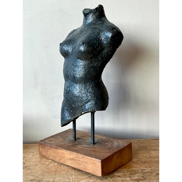 This arresting vintage sculpture embodies the raw, textural power of the Brutalist movement combined with classic figural...