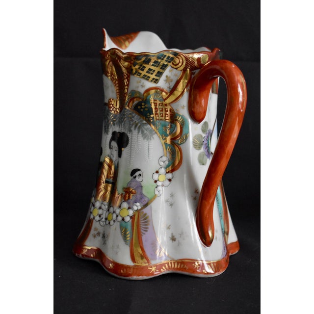 Antique 1919 Pitcher, Jug is Japanese. Hand Painted Porcelain. Multicolor. The Measurements: 5.5"W x 6"D x 7.5"H. Flat...