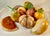 This is a bright and festive array of summer fruits and a couple of vegetables with a realistic appearance and a polished...
