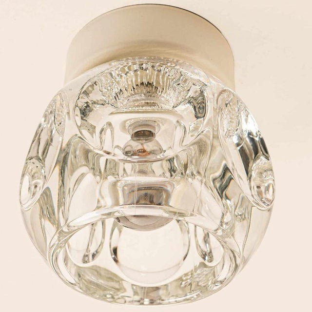 Several original glass wall sconces or flush mounts Cosack Lights, Germany, 1970s Original 1970s modernist wall light with...