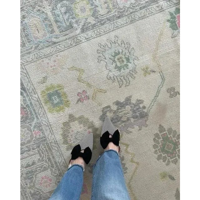 Dove Gray with pops of bright Pink, Lavender & Sky Blue handknotted modern oushak rug As all of our rugs are made by hand,...