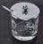 1940s Flemington etched jelly jar with spoon is an elegant and collectible kitchen piece, featuring etched glass or...