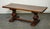 Beautiful Vintage Refectory Coffee Table In The Style Of Robert "Mouseman" Thompson. Features a striking dazed textured...