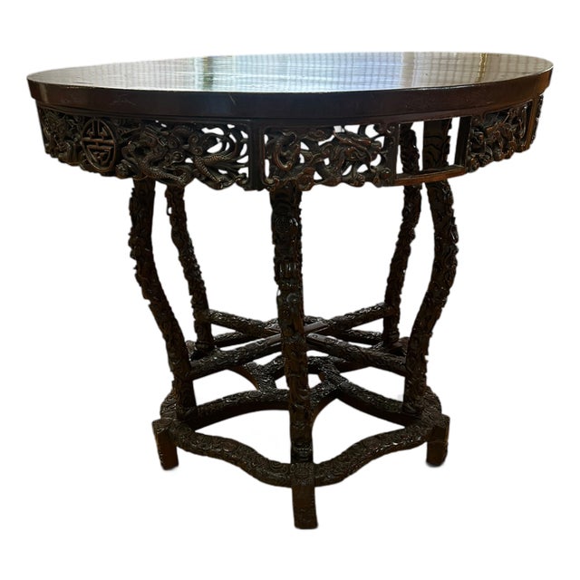Early 20th Century Chinese Chippendale Style Carved Rosewood Round Center Hall Table With Dragon Motifs For Sale