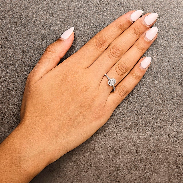 Early 21st Century 14K White Gold 1/5 Cttw Diamond Oval Shape With Halo Engagement Ring (H-I Color, I1-I2 Clarity) - Size 9.5 For Sale - Image 5 of 6