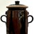 Hand-crafted stoneware pottery jar With two handles on either side. Topped by a unique "mushroom" lid. Exterior is glazed...