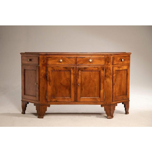 Large mid-19th century Vicenza molded walnut sideboard, restored conservatively. It retains its original brass hinges and...