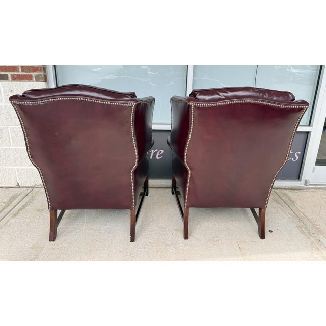 Mid 20th Century Pair of Vintage Maroon Leather Wingback Chairs by Classic Leather For Sale - Image 5 of 17