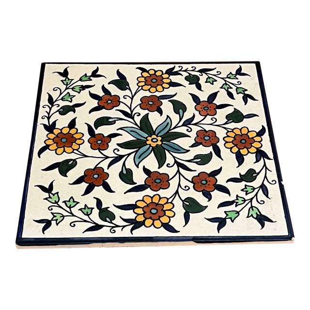 Vintage Ceramic Tile Depicting a Hand Painted Floral Design. For Sale