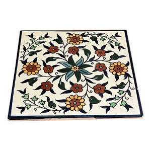 Vintage Ceramic Tile Depicting a Hand Painted Floral Design.