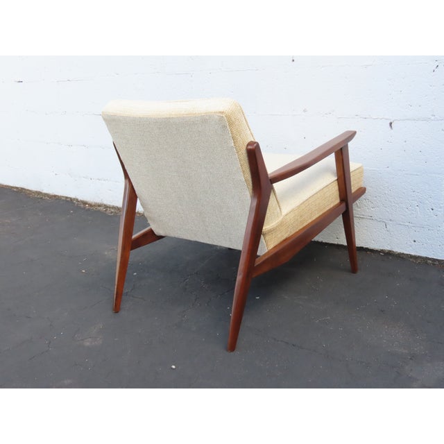 This Side Chair is made out of wood, solid wood, and upholstery. This Chair has Mid Century Modern style and design, and...