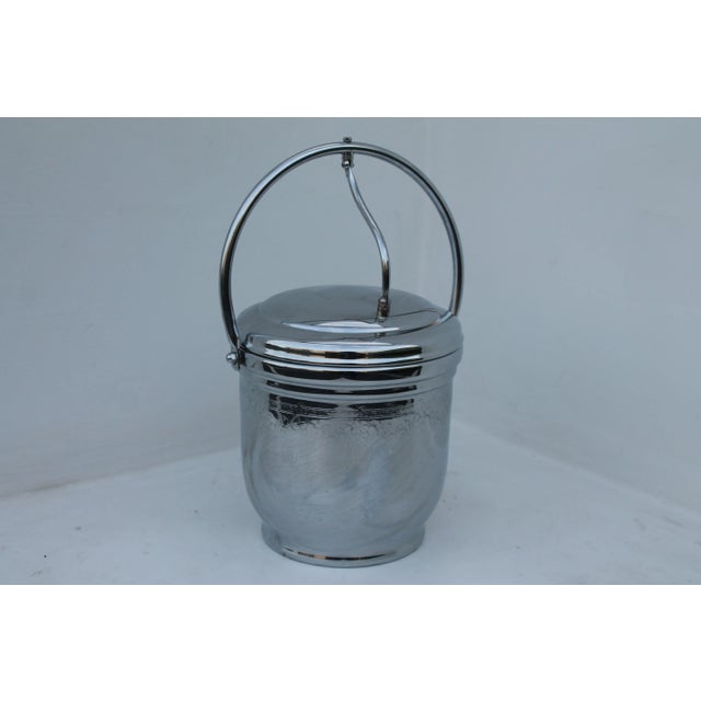 Lovely Mid Century Modern 1970's Chrome/ Glass Ice Bucket. Manufactured by The United Solid Brass Co. U.S.A.