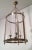 This neoclassical large lantern is made of brass and silver plated with strong plastic rounded faux-glass. This is a...
