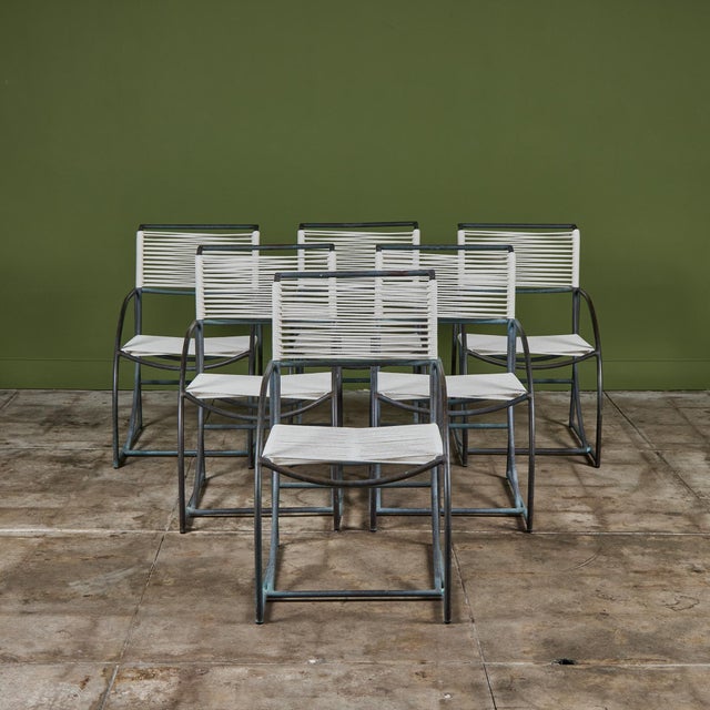 Set of six patio dining armchairs by Kipp Stewart for Terra of California, USA, c.1970s. The chairs feature a bronze tube...