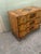 Very elegant chest of drawers in light walnut, with beautiful inlays in dark walnut root veneer, edged with ash fretwork,...